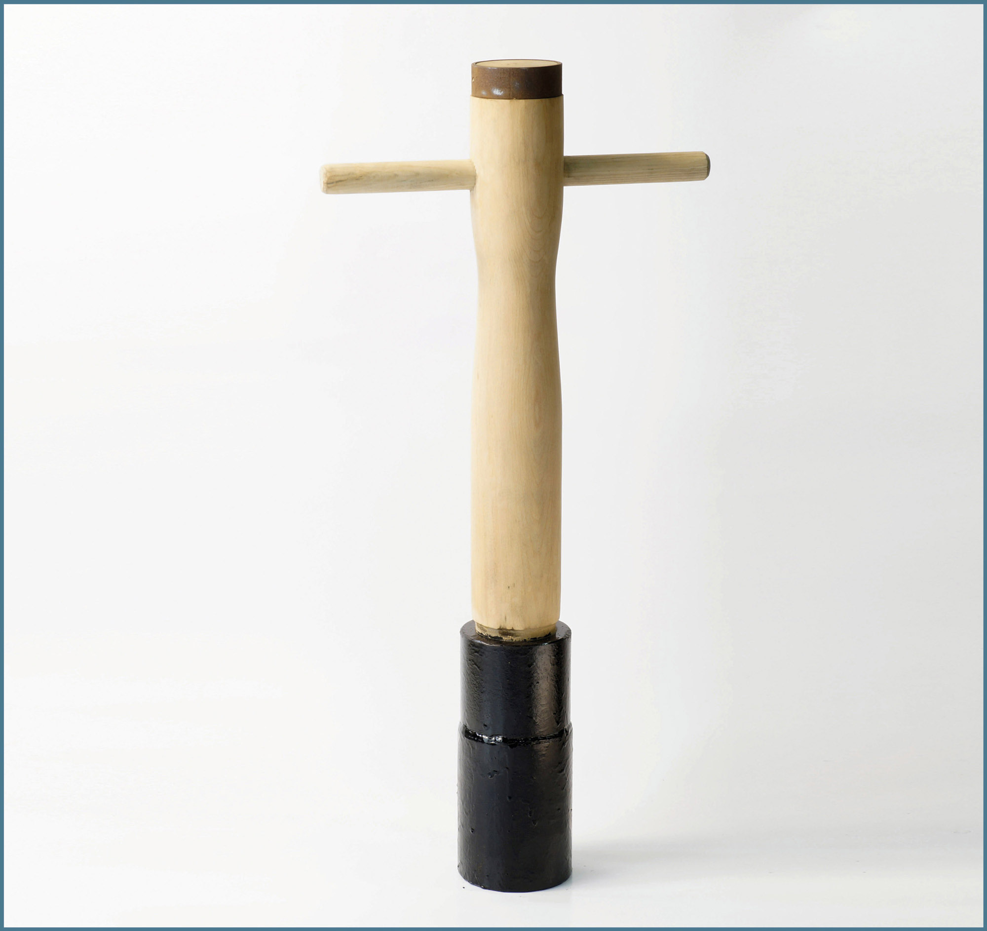 Großpflasterramme mit Holzpuppe